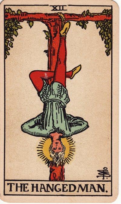 The Hanged Man tarot meaning money